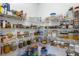 Walk-in pantry with ample shelving, perfect for organized storage of food and kitchen supplies at 2430 Redbud Meadow Ln, Douglasville, GA 30135