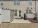 The backyard patio has an outdoor grill and a storage shed, which is perfect for outdoor living at 3318 Sardis Bend Dr, Buford, GA 30519