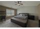 Comfortable primary bedroom featuring a soft bed with modern decor and plenty of natural light at 3318 Sardis Bend Dr, Buford, GA 30519