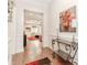 Welcoming foyer that flows seamlessly into the living space, showcasing hardwood floors at 1555 Water Vista Ct # 4102, Cumming, GA 30041