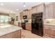 Kitchen featuring stainless appliances, granite countertops and wood cabinets at 1555 Water Vista Ct # 4102, Cumming, GA 30041