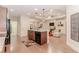 Kitchen island overlooking living area with fireplace and built-ins at 1555 Water Vista Ct # 4102, Cumming, GA 30041