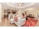 Open-concept living and dining area with kitchen bar and hardwood floors at 1555 Water Vista Ct # 4102, Cumming, GA 30041