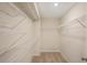 Walk-in closet featuring wire shelving on the walls, allowing for ample storage and organizational solutions at 2335 Portrush Way (Lot 26) Dr, Atlanta, GA 30339