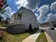 Beautiful townhome with modern architecture, well-maintained lawn, and convenient street access at 2335 Portrush Way (Lot 26) Dr, Atlanta, GA 30339