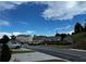Street view of new construction homes featuring garages and modern design elements at 2335 Portrush Way (Lot 26) Dr, Atlanta, GA 30339
