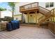 Relaxing back deck features a two level deck, backyard access, and space to entertain at 3161 Pagoda Trce, Lawrenceville, GA 30043