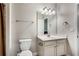Cozy bathroom with a single vanity and a combination tub/shower, offering a practical and comfortable space at 4831 Miller Hill Rd, Buford, GA 30518