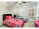 This bedroom features carpet and two beds with colorful Paw Patrol themed bedding at 4831 Miller Hill Rd, Buford, GA 30518