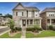 Charming two-story home with a brick facade, landscaped yard, and a welcoming covered front porch at 4831 Miller Hill Rd, Buford, GA 30518