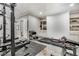 Finished basement featuring home gym with a weight rack and workout equipment at 4831 Miller Hill Rd, Buford, GA 30518