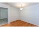 Dining room with hardwood floors and traditional white molding at 307 Berkeley Woods Dr, Duluth, GA 30096