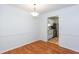 Dining room view into the updated kitchen with stainless steel appliances at 307 Berkeley Woods Dr, Duluth, GA 30096