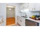 Updated kitchen featuring stainless steel appliances and quartz countertops at 307 Berkeley Woods Dr, Duluth, GA 30096