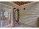 Cozy patio offers outdoor living space with a ceiling and light fixture at 307 Berkeley Woods Dr, Duluth, GA 30096