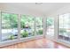 Bright, airy sunroom offering natural light and beautiful outdoor views at 307 Berkeley Woods Dr, Duluth, GA 30096