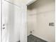 A utilitarian laundry area with built-in shelf at 7331 Wagon Wheel Ct, Jonesboro, GA 30236