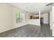 Bright living area with tile floors, kitchen view, and natural light at 7331 Wagon Wheel Ct, Jonesboro, GA 30236