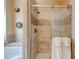 Beautiful bathroom features a glass shower with stone tile accents and a decorative wall at 133 Parkway Dr, Fairburn, GA 30213
