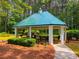 Inviting community gazebo featuring seating, grills, and landscaping for outdoor enjoyment at 133 Parkway Dr, Fairburn, GA 30213