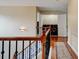 Hallway with stairs leading to a laundry room featuring front load washer and dryer at 133 Parkway Dr, Fairburn, GA 30213
