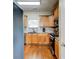 Well-lit kitchen featuring wood cabinets, granite countertops, stainless steel appliances, and subway tile backsplash at 133 Parkway Dr, Fairburn, GA 30213