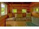 Cozy treehouse interior with wood paneling and seating at 133 Parkway Dr, Fairburn, GA 30213