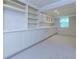 Finished basement area boasting built-in cabinets, countertop and shelves for storage and display at 2995 Aspen Ridge Ct, Snellville, GA 30078