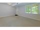 Basement featuring a door to the outside, a window, and carpet at 2995 Aspen Ridge Ct, Snellville, GA 30078
