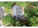 An aerial view of the home's roof, mature trees, and surrounding green landscape at 4504 Reva Ne Way, Marietta, GA 30066