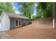 A backyard features a detached structure, hammock and pine straw ground cover at 4504 Reva Ne Way, Marietta, GA 30066