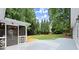 Beautiful backyard featuring a screened porch and lush green lawn at 4504 Reva Ne Way, Marietta, GA 30066