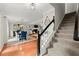 Inviting foyer with staircase leading to the dining room and living room at 4504 Reva Ne Way, Marietta, GA 30066
