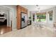 Bright kitchen with stainless steel refrigerator, granite countertops, and breakfast nook at 4504 Reva Ne Way, Marietta, GA 30066