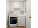 Compact laundry room featuring a modern washer and dryer set at 4504 Reva Ne Way, Marietta, GA 30066