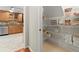 Organized pantry with wire shelving and bins, complemented by an eat-in kitchen with stainless steel appliances at 4504 Reva Ne Way, Marietta, GA 30066