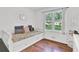 Cozy bedroom features natural light, hardwood floors and neutral colors at 1981 Bramblewood Ne Dr, Brookhaven, GA 30329