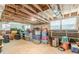 The large, unfinished basement includes ample space for storage or customization, and two small windows at 218 Ward Rd, Ellenwood, GA 30294