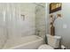 Tiled tub and shower combination with glass doors at 218 Ward Rd, Ellenwood, GA 30294