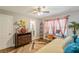 Bedroom featuring a daybed, desk, and en-suite bathroom access at 218 Ward Rd, Ellenwood, GA 30294