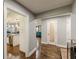 Hallway leads to a kitchen and dining area, showcasing an open floor plan and natural light at 218 Ward Rd, Ellenwood, GA 30294