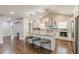 Beautiful kitchen features stainless steel appliances, granite countertops, and an island with bar seating at 218 Ward Rd, Ellenwood, GA 30294