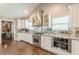 Well-equipped kitchen features stainless steel appliances, ample counter space, and modern cabinets at 218 Ward Rd, Ellenwood, GA 30294