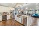 Modern kitchen with stainless steel appliances, a kitchen island, and an open layout at 218 Ward Rd, Ellenwood, GA 30294