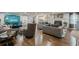 Spacious living room with hardwood floors, stylish furnishings, and ample natural light at 218 Ward Rd, Ellenwood, GA 30294