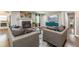 Cozy living room featuring comfortable seating, a fireplace, and a television for relaxation and entertainment at 218 Ward Rd, Ellenwood, GA 30294