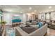 Comfortable living room with stylish furniture, a modern fireplace, and hardwood flooring at 218 Ward Rd, Ellenwood, GA 30294