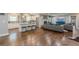 Open-concept kitchen and living area with modern appliances and stylish decor at 218 Ward Rd, Ellenwood, GA 30294