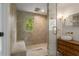Bright bathroom with a seamless glass shower, modern fixtures, and a stylish single sink vanity at 2912 Vinings Forest Se Way, Atlanta, GA 30339
