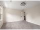 Bright bedroom featuring neutral carpet, fan lighting, and large windows at 2912 Vinings Forest Se Way, Atlanta, GA 30339